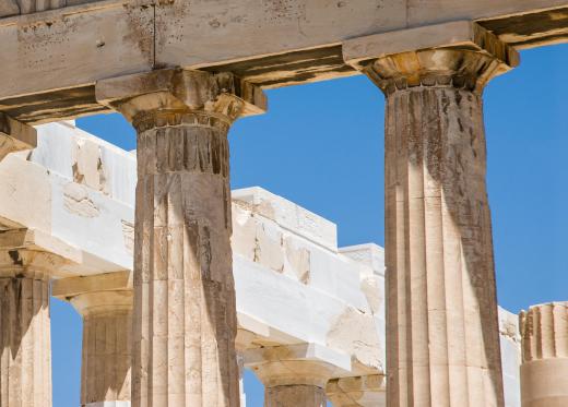 The Parthenon is surrounded by Doric columns.