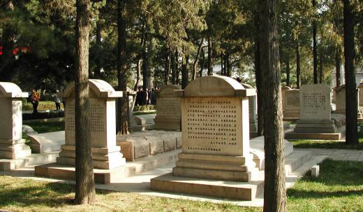 People travel to graves to pray and offer up thanks to the dead during the Festival of Pure Brightness.