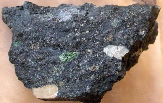 The presence of kimberlite rocks in an area may be indicative of the presence of diamonds.