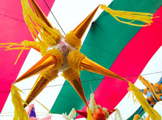 During Las Posadas, children play with a piñata that is typically shaped like a star.