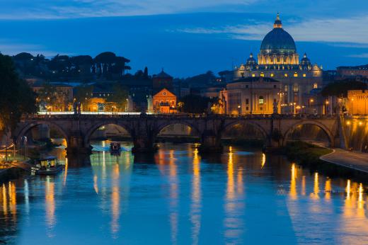 The most prominent landmark on Vatican City is the dome of St. Peter's Basilica, which can be easily viewed from the banks of the Tiber River.