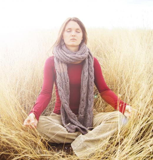 While living in an ashram, practitioners spend many hours in meditation.